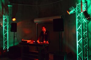 DJ setup at Silo Park Auckland. Hire Dj gear and DJ equipment. This photo shows a sound system and lighting as well as a DJ table setup inside the Silos!