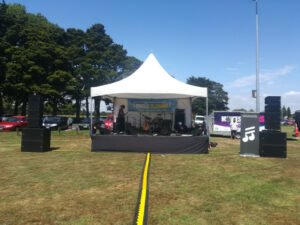 Hire a Covered stage - springtop marquee covered stage rental.
