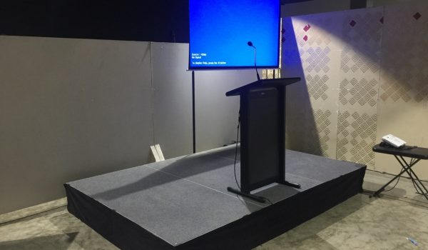 small stage podium and lectern hire. Available with projector and screen or TV hire too.