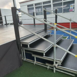 Extra Wide Steps with handrails as an optional extra. This also sometimes gets used as a choir riser or tiered seating option.