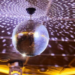 This picture shows the mirrorball lighting effect. A shimmering and shiny special effect that can be brought to life at your event. Hire a mirror ball or disco ball hire auckland with pinspot from the rock factory.