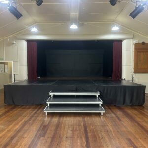 Stage Hire at Buckland Hall we built a stage extension with large steps out the front. We can provide flexible staging rental solutions such as this stage extension at a local community hall or the local school.