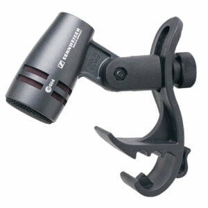 Senheiser e604 Drum Mic. A small dark grey microphone with a plastic clip attached. The toothed clip goes onto the rim of a drum.