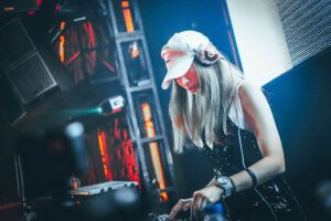 This photo shows a female DJ doing her thing. Its a stock photo representing DJ Hire Auckland.