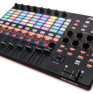 Control desk with multiple coloured pads and faders.