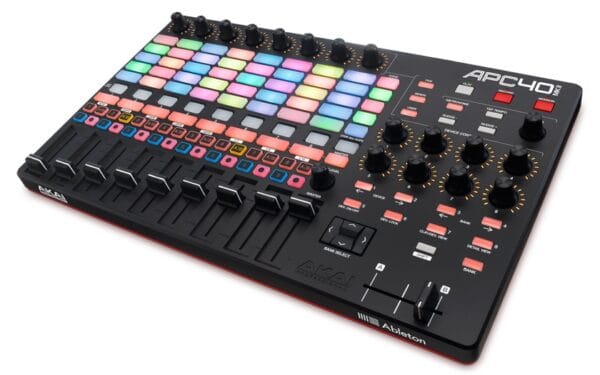 Control desk with multiple coloured pads and faders.