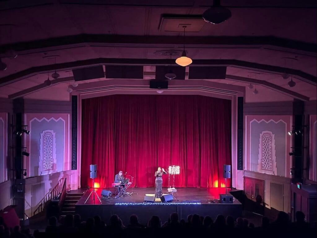 Photo of PA system setup for Jackie Clarke during her Jackie goes Prima Diva Tour. Sound System hire options.
