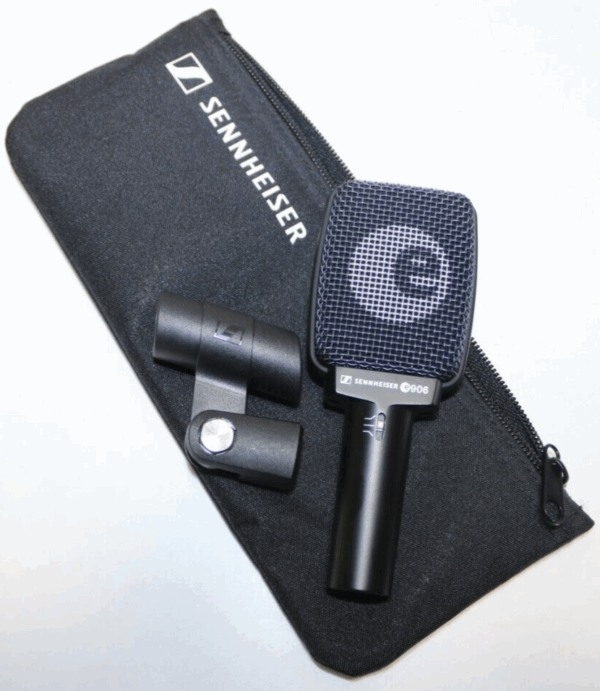 Photo of a hire Sennheiser e906 guitar amplifier hanging microphone with it's pouch and clip.