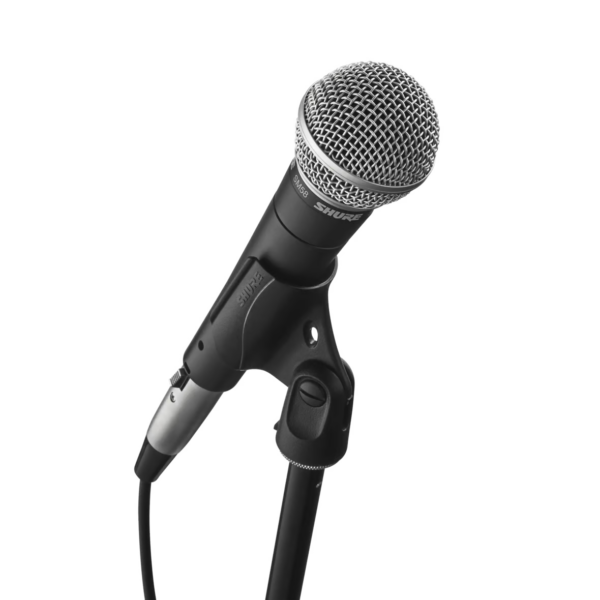 A close up picture of the classic industry standard vocal microphone - the Shure sm58. The picture shows the clip and the top of the stand. These items can be hired from The Rock Factory in Auckland.