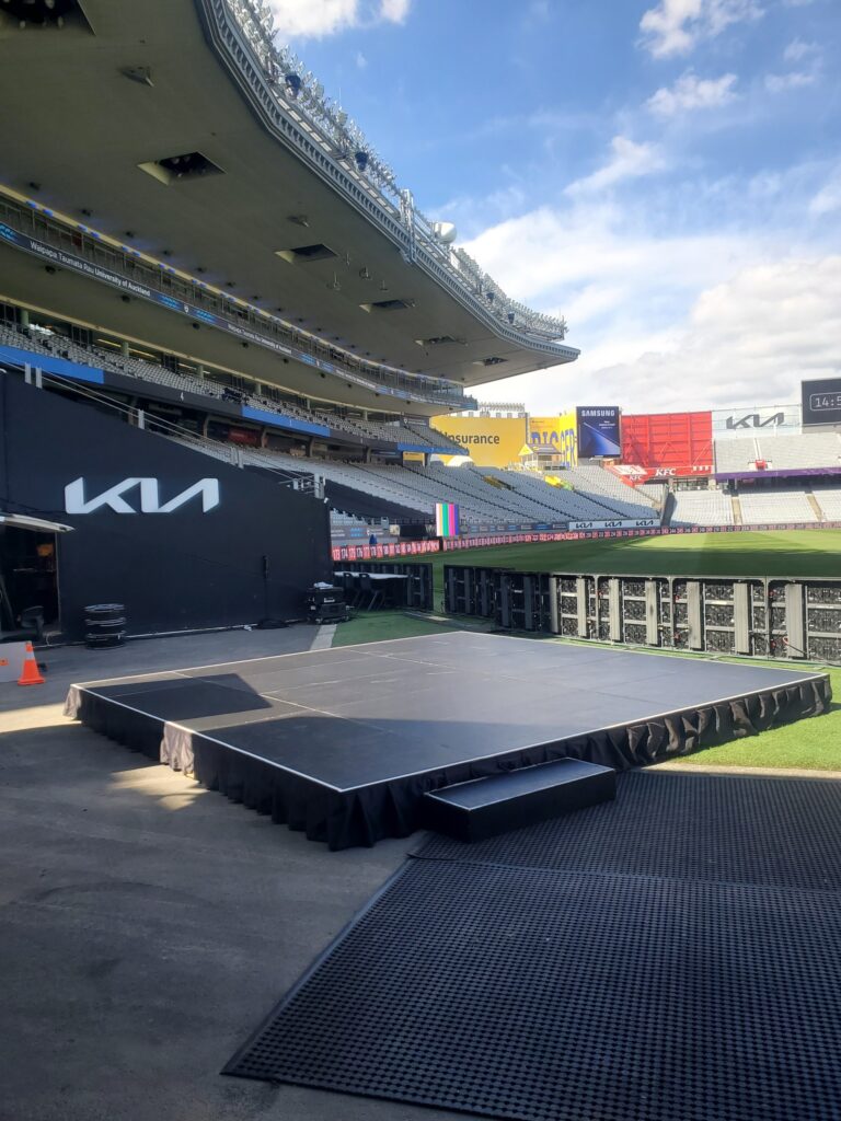 A custom stage built at eden park for a client side of field riser. The Rock Factory in Auckland can provide you with a quote for a custom stage, riser or even a catwalk.