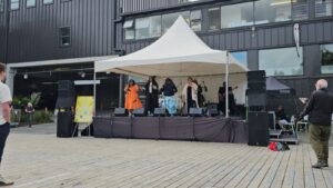6x6 springtop community stage available for covered stage hire in Auckland. This picture shows the stage setup for titirangi festival carpark.